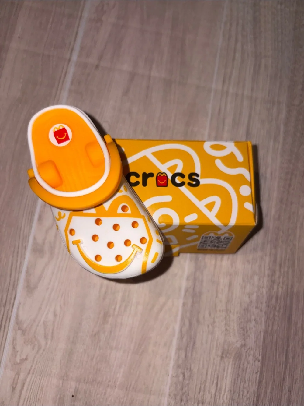 CROCS Collectible White and Orange Smiley